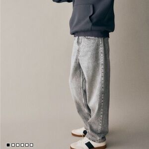 Loose-fit jeans with adjustable waistband, and straight legs.